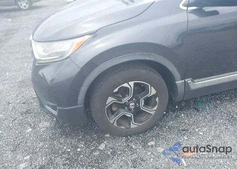 2017 Honda Cr-V Touring z USA, uszkodzony, nr VIN 2HKRW2H99HH615018